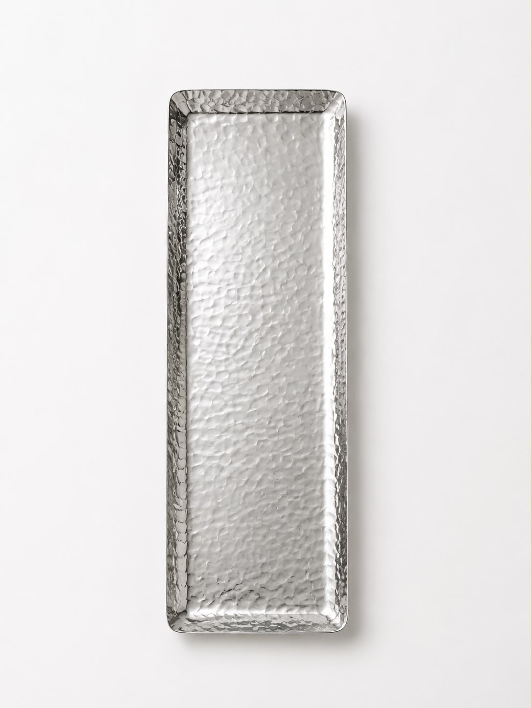 A rectangular metal tray with a hammered, textured finish, shown vertically against a plain white background.