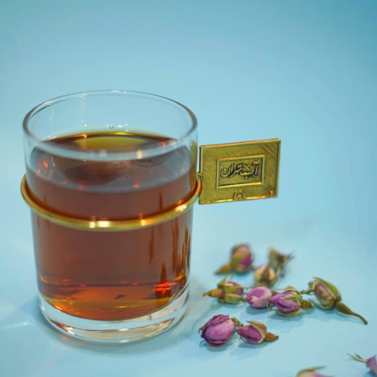 Abeh Tehran inspired clear tea glass with artistic gold handle