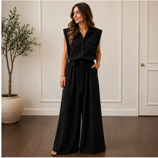Black sleeveless wide leg jumpsuit with tie waiste