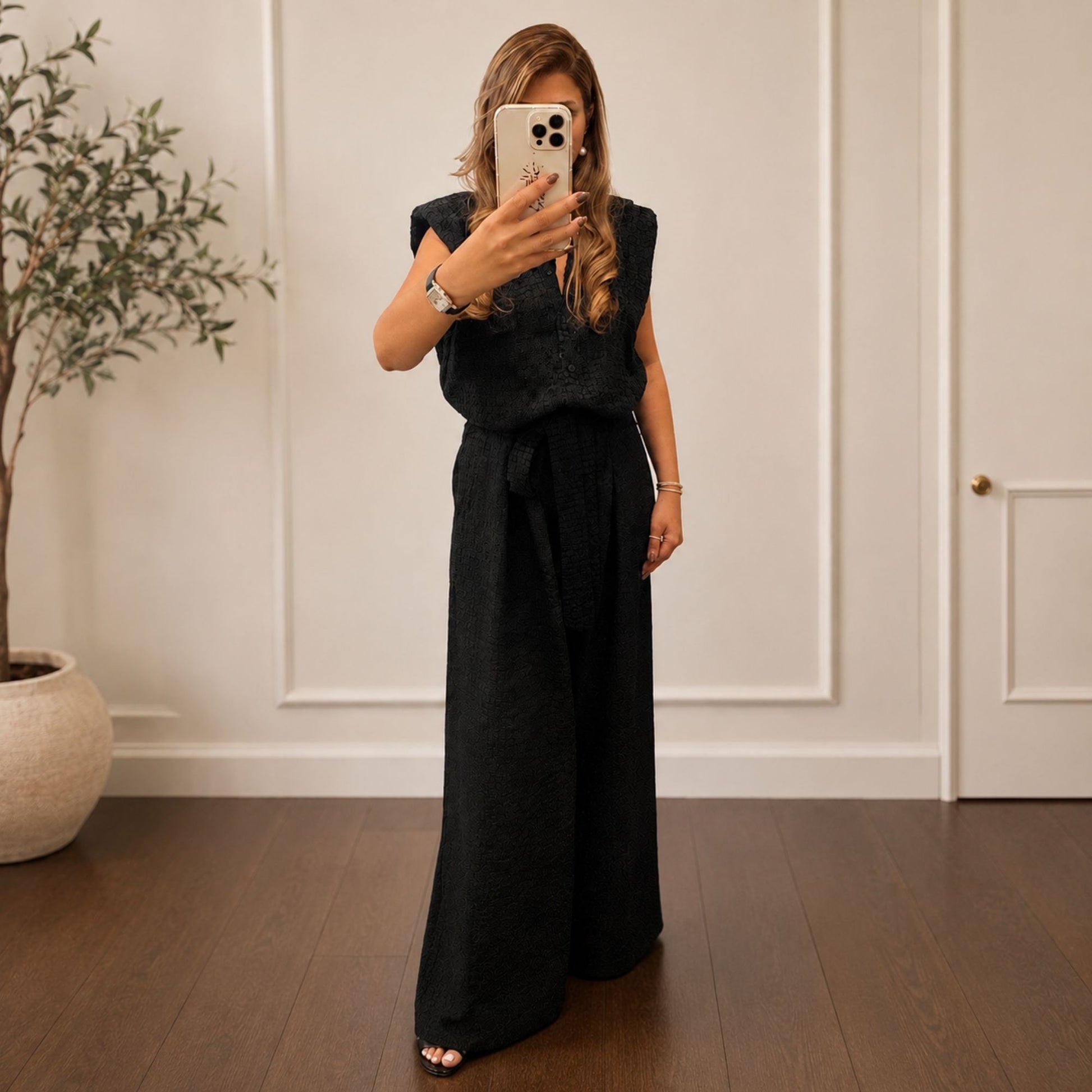 Black sleeveless wide-leg jumpsuit