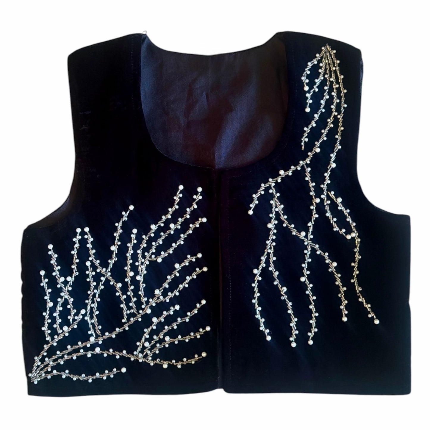 A sophisticated, boutique-style name inspired by the pearl vines across the velvet
