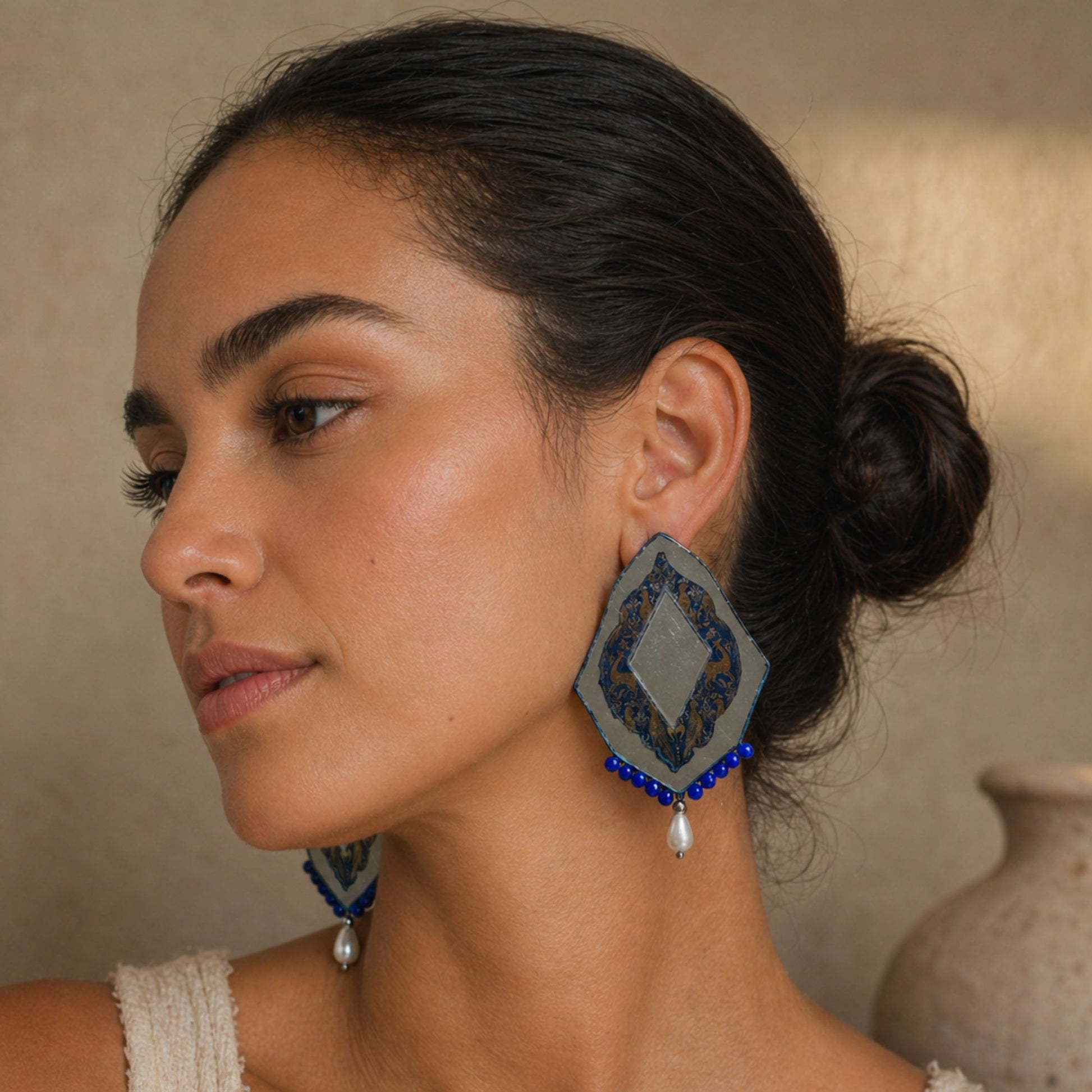 artistic mirror earrings blue and pearl detail in geometric shape