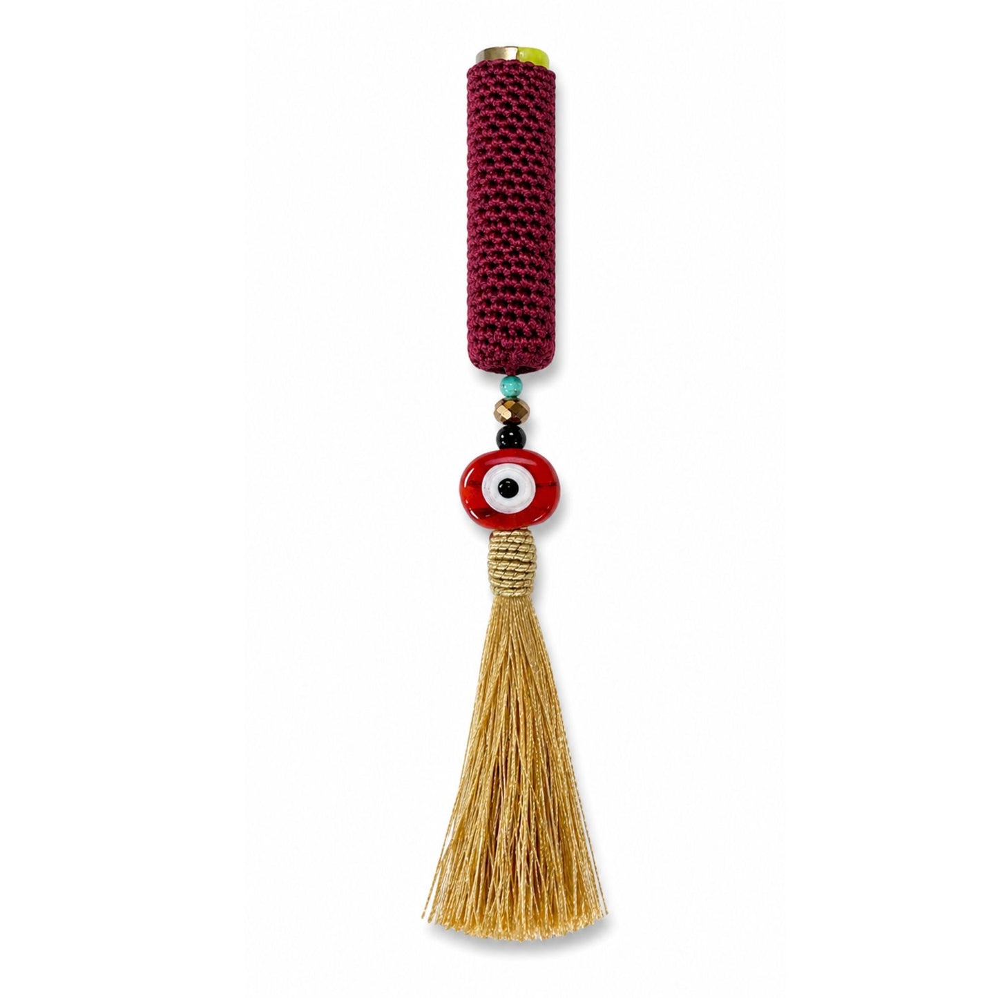 Handwoven cover in dark brown with gold tassel and evil eye bead design