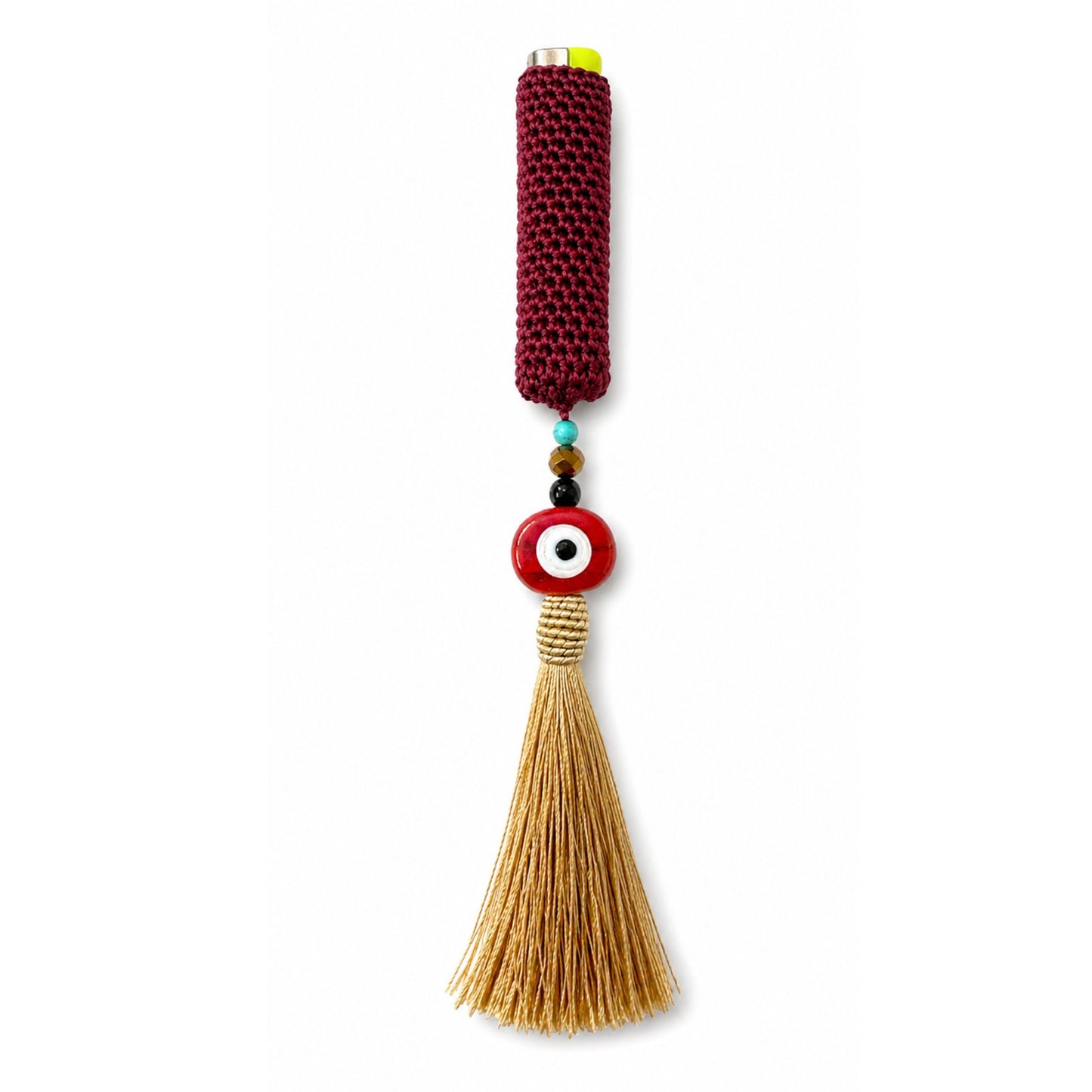 Handwoven cover in burgundy and gold tassel and evil eye bead design