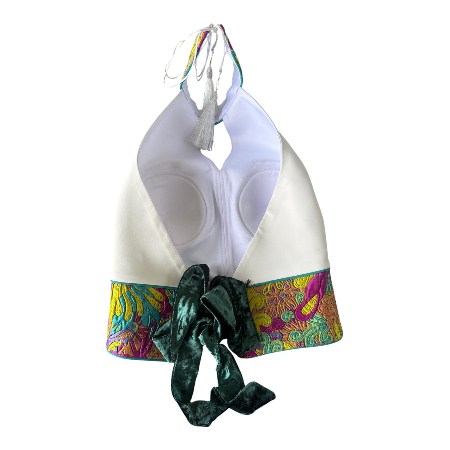 Back of the white corset crop top with green tie back and halter neck