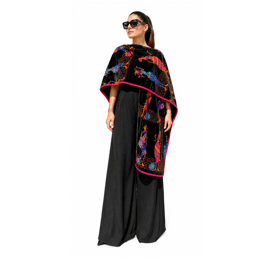 Front view of embroidered velvet poncho in free size with colorful handmade patterns