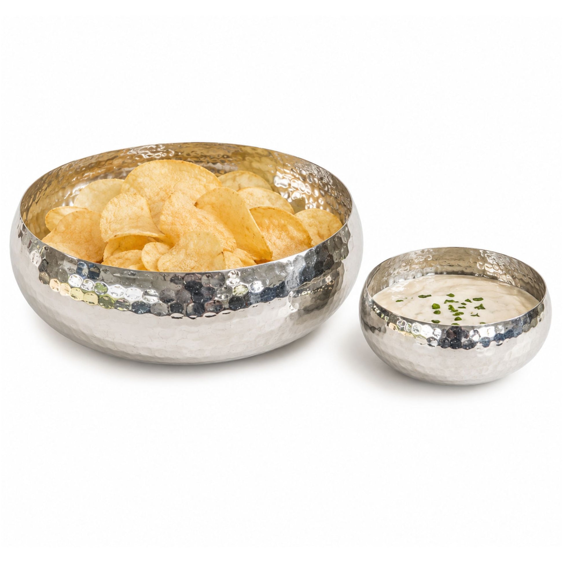 Hammered white copper serving bowls styled with potato chips and creamy dip.
