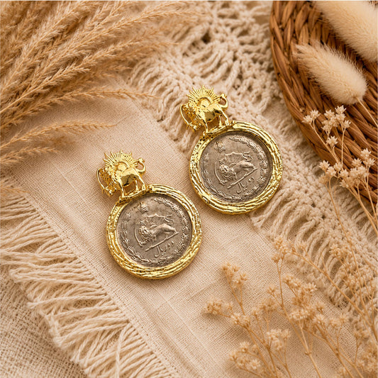 Pahlavi coin collection with lion and sun gold plated frame closeup