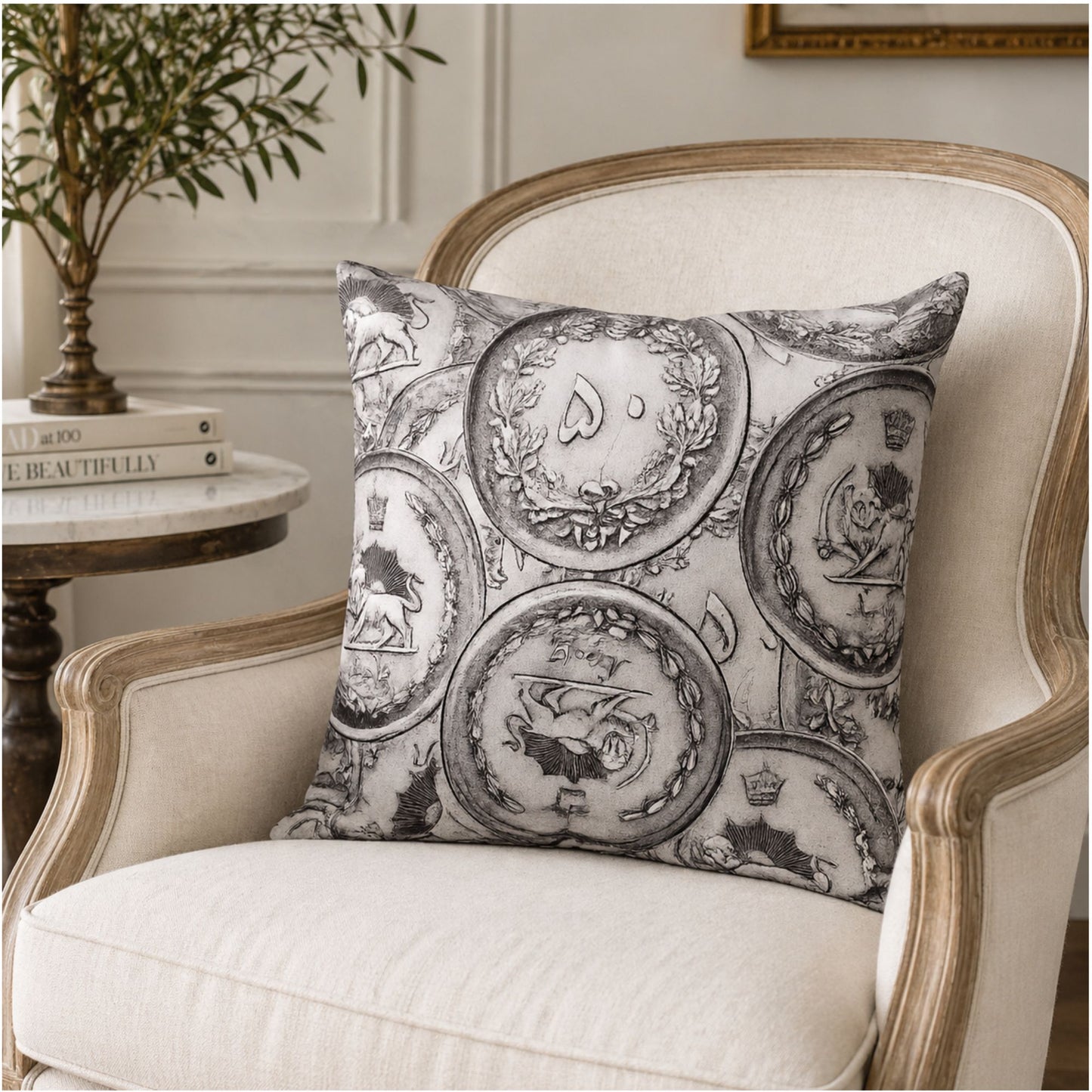persian pahlavi coin cushion styled on modern chair neutral decor