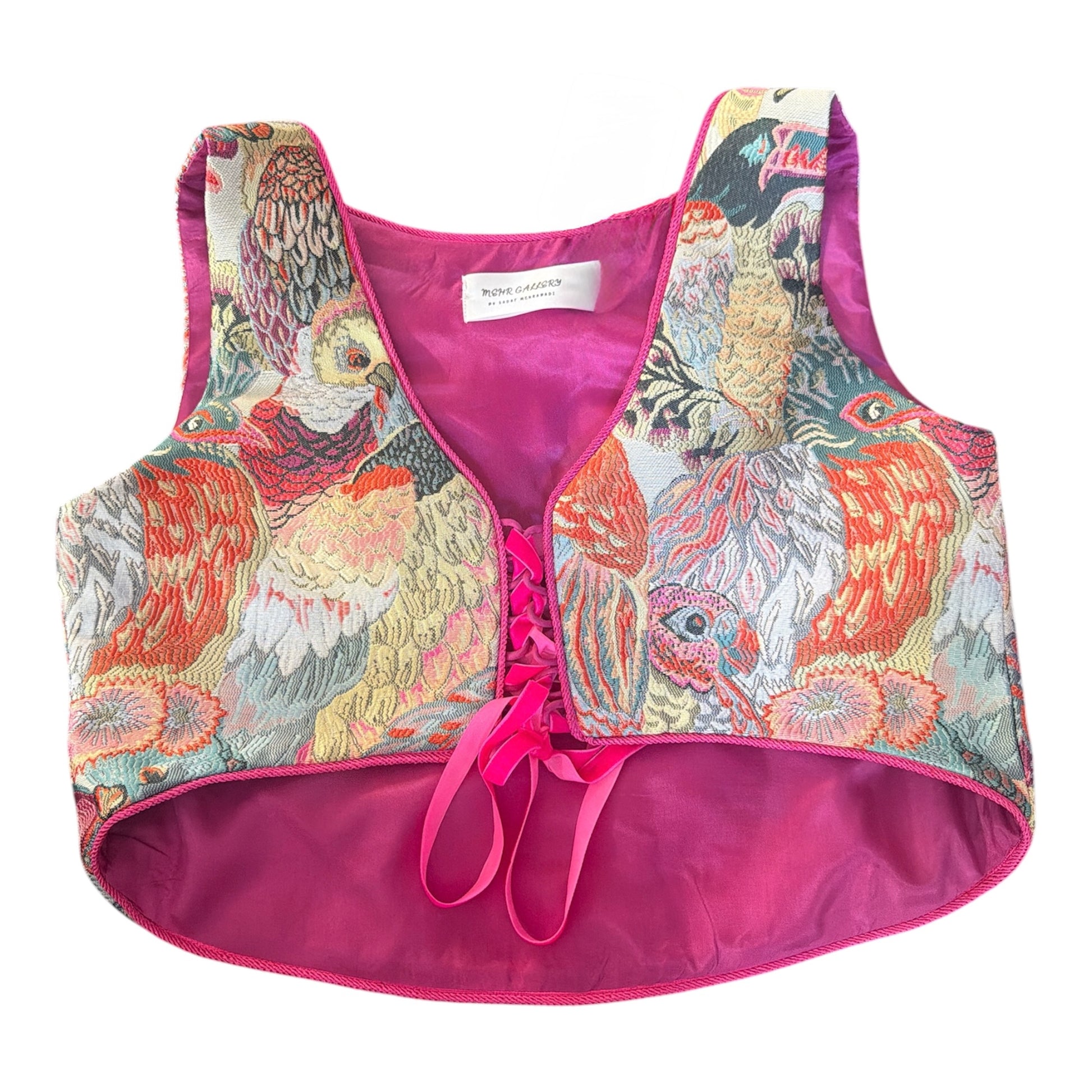 Colorful parrot-patterned vest with pink accents 