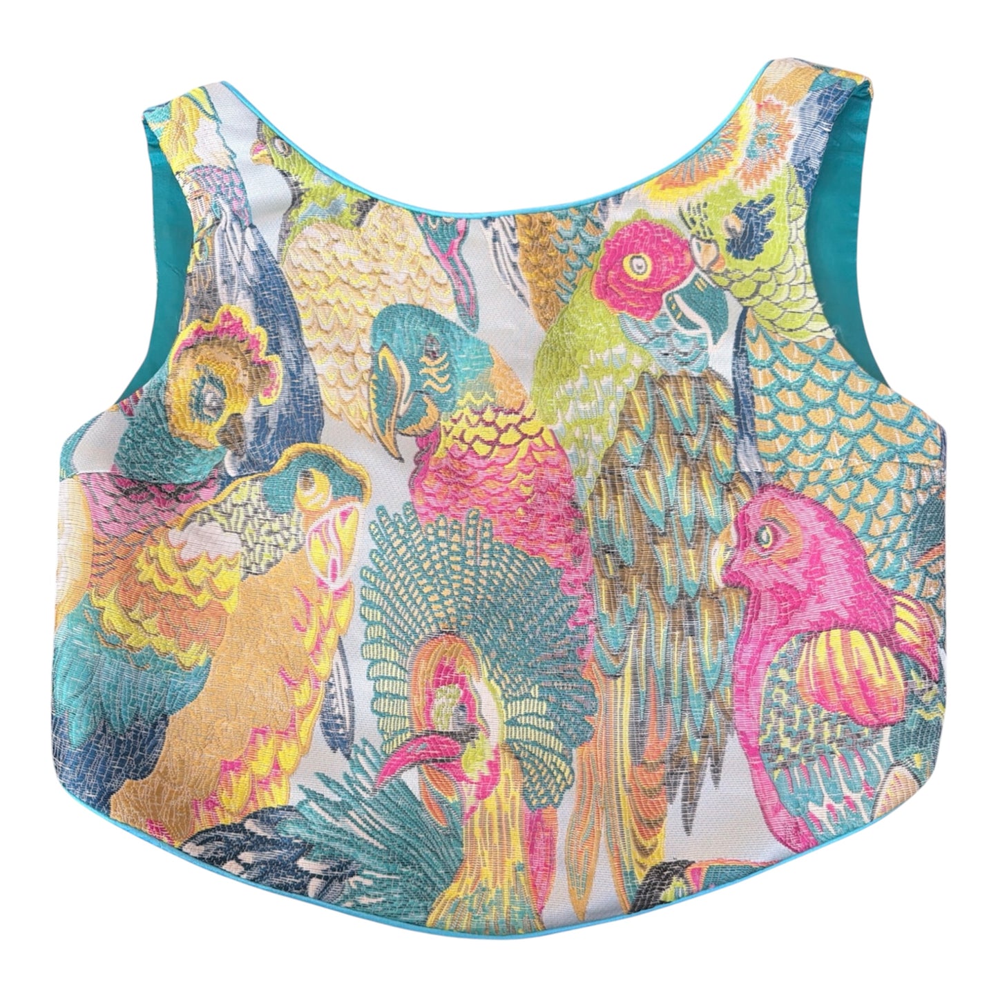 front of a colorful parrot patterned top 
