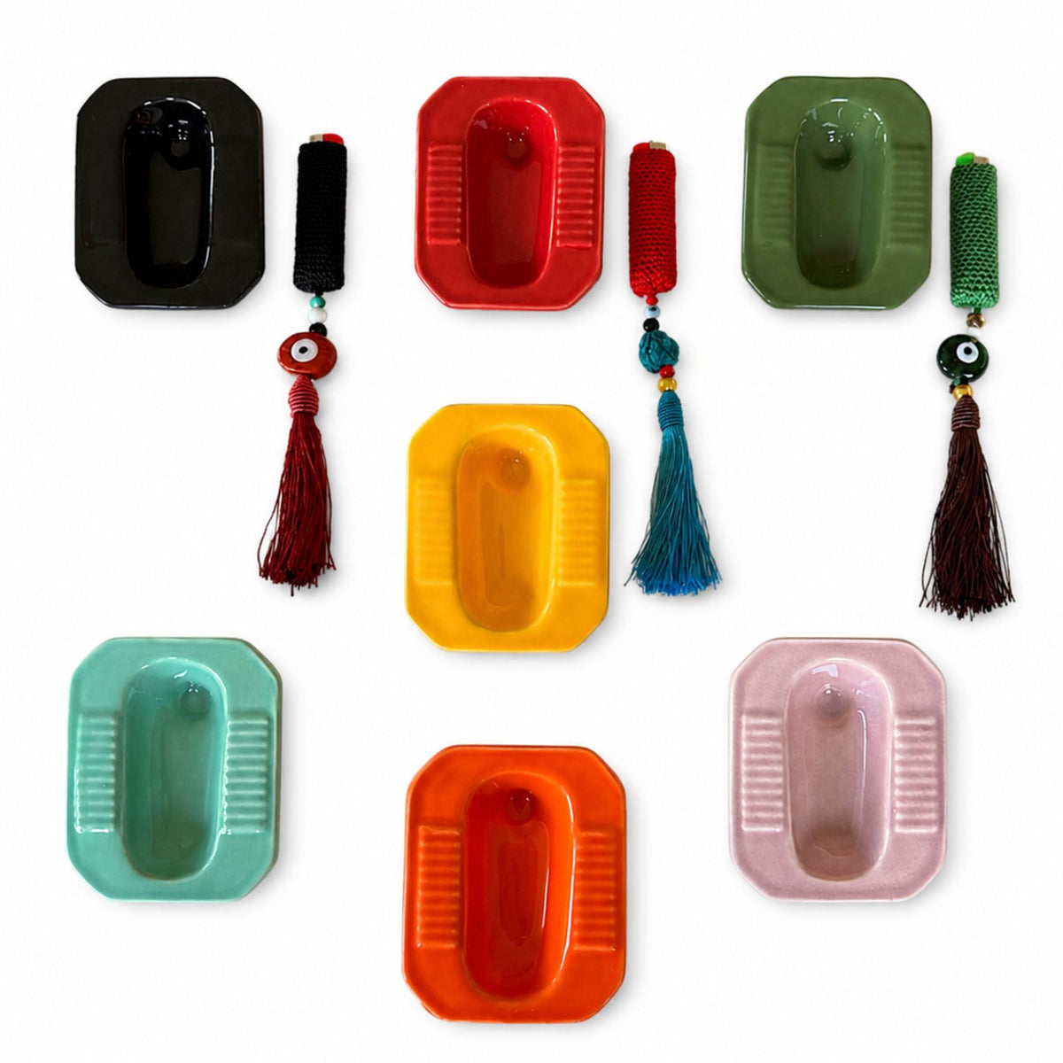 collection of art in glossy ceramic dishes in vibrant colors