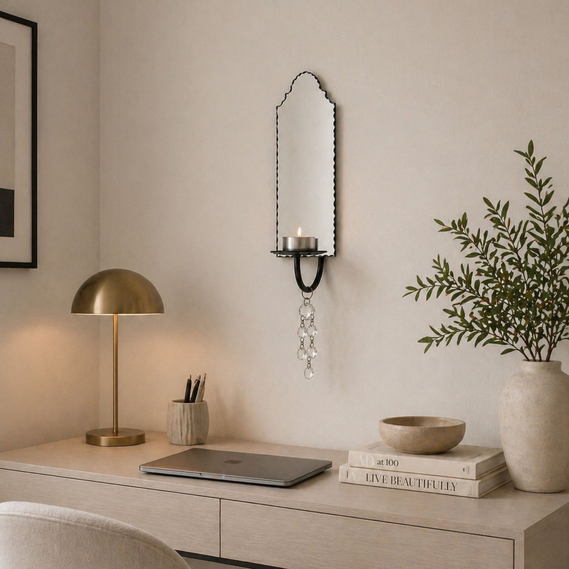 Modern home office setup decorated with a venetian mirror candle holder sconce